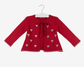 Burgundy jacket with white bodoques. O-Winter